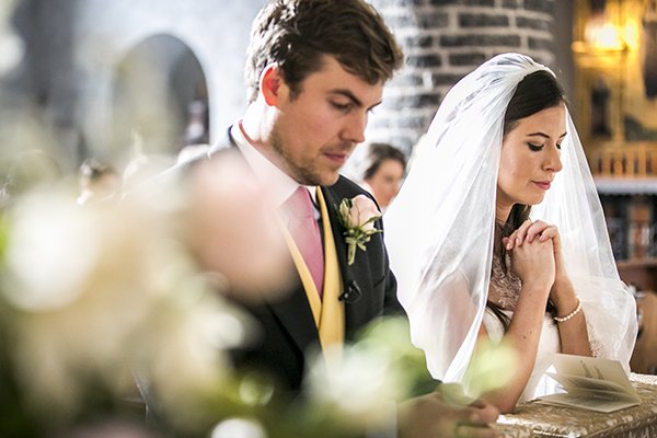 Image of Bride and Groom Prays in Their Wedding